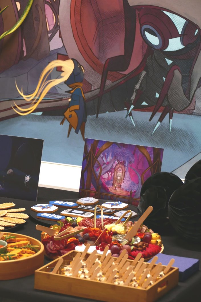 Évènement pour le lancement du nouveau jeu vidéo MIO pour Pull Up avec de la nourriture sucré salé et un gateau personnalisé