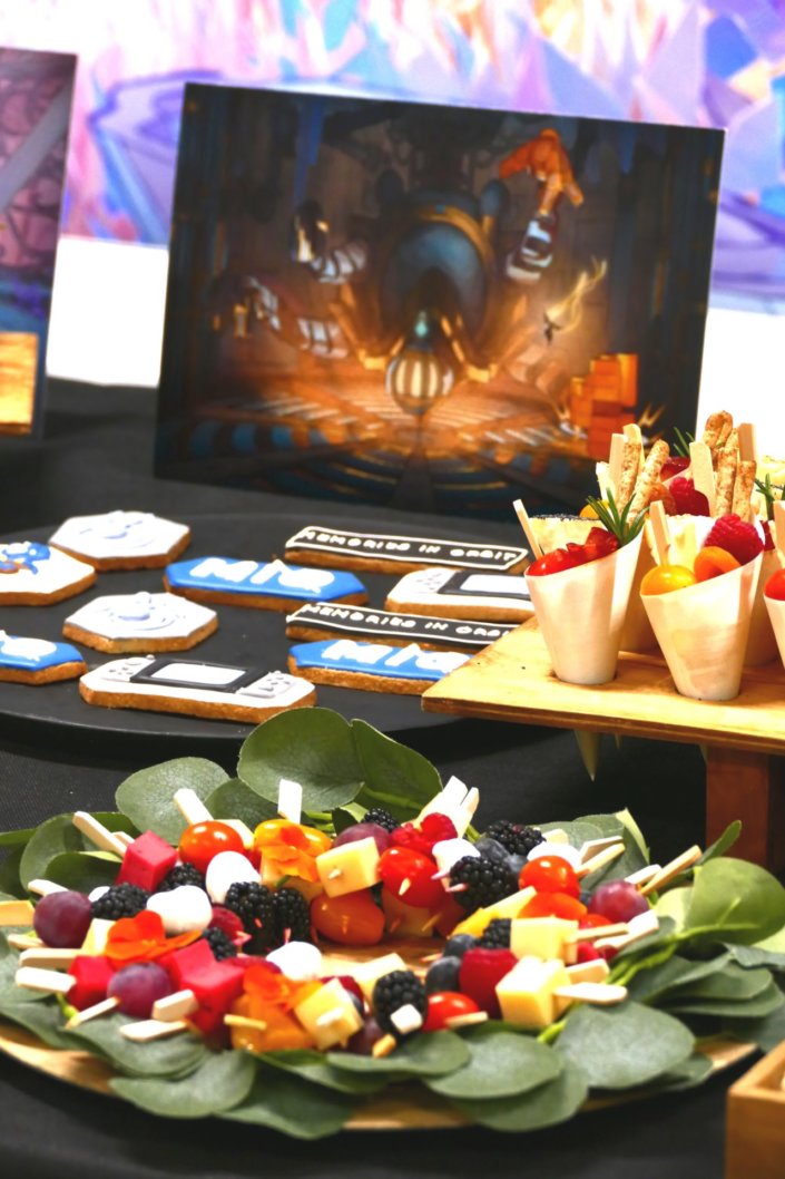 Évènement pour le lancement du nouveau jeu vidéo MIO pour Pull Up avec de la nourriture sucré salé et un gateau personnalisé