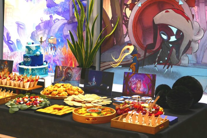 Évènement pour le lancement du nouveau jeu vidéo MIO pour Pull Up avec de la nourriture sucré salé et un gateau personnalisé