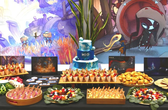 Évènement pour le lancement du nouveau jeu vidéo MIO pour Pull Up avec de la nourriture sucré salé et un gateau personnalisé