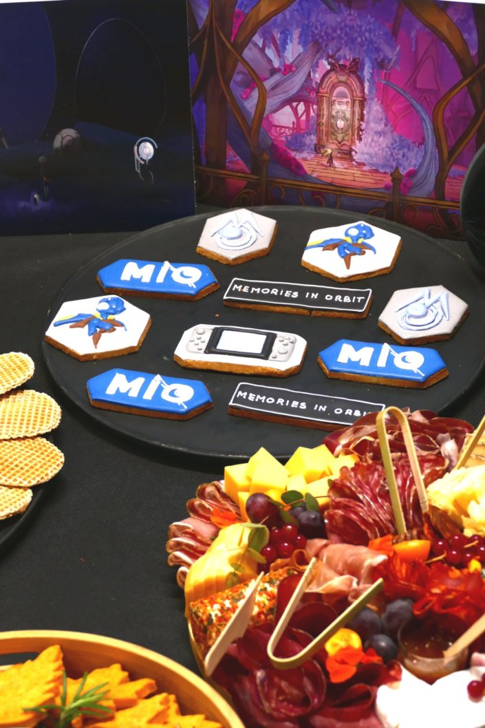 Évènement pour le lancement du nouveau jeu vidéo MIO pour Pull Up avec de la nourriture sucré salé et un gateau personnalisé